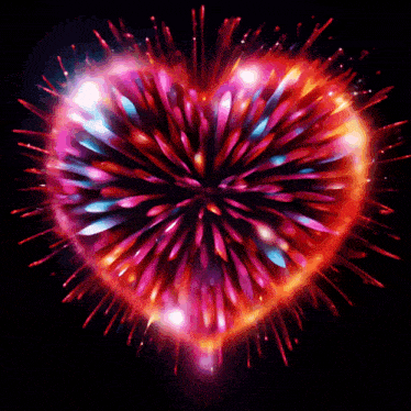 fireworks in the shape of a heart are displayed