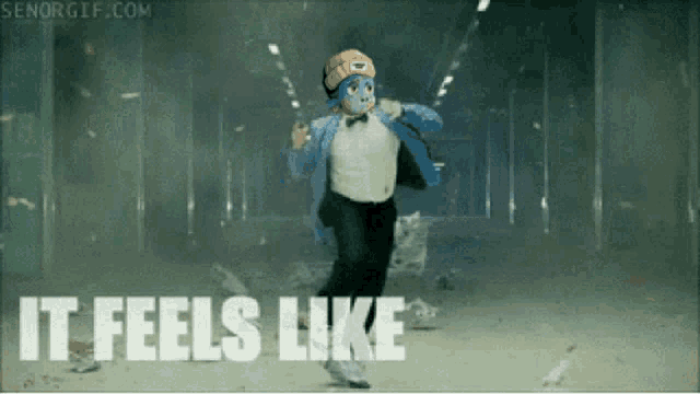 a man with a mask on his face is running with the words " it feels like " behind him