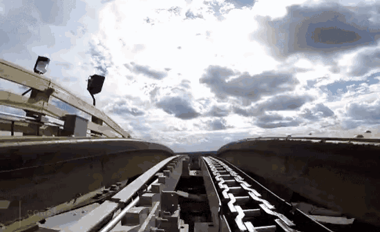 a roller coaster going down a track with the word coasters on the bottom