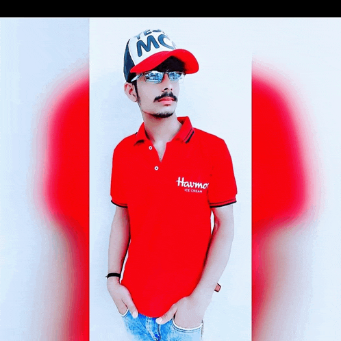 a man wearing a red shirt that says harmo on the front