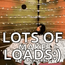 a woman is laying in a pile of money with the words `` lots of make loads '' written on it .