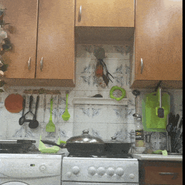 a kitchen with wooden cabinets and a bottle that says latte on it