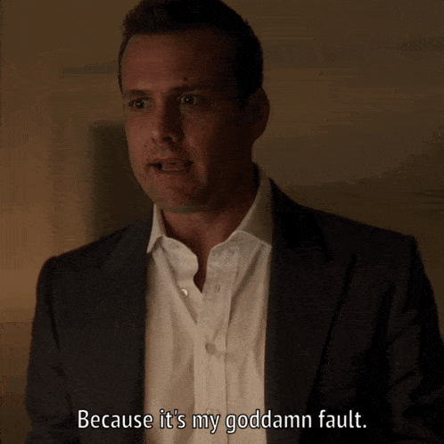 a man in a suit and white shirt is saying because it 's my goddamn fault