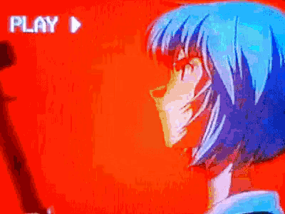 a close up of a person 's face with the word play in the corner .