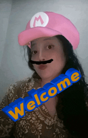 a woman wearing a pink mario hat and a mustache is holding a welcome sign
