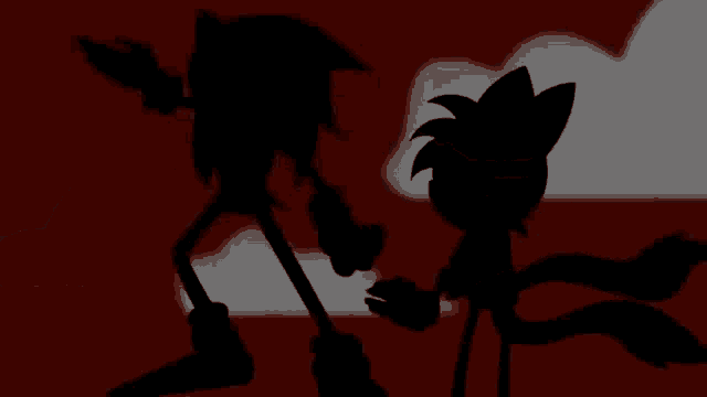 a couple of cartoon characters standing next to each other in silhouette