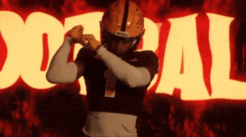 a football player in front of a sign that says doral