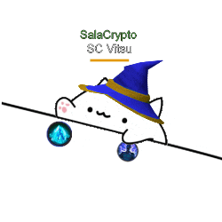 a white cat wearing a blue witch hat and holding a blue ball .