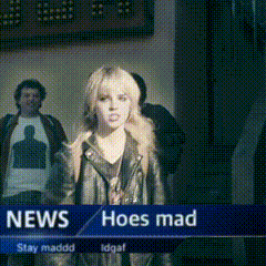 a woman is standing in front of a news sign that says hoes mad