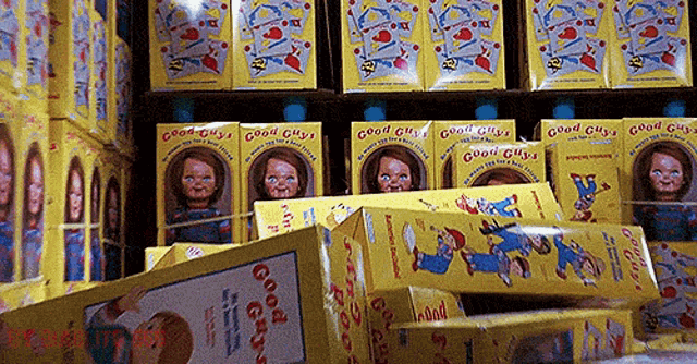 a bunch of good guys dolls are on display