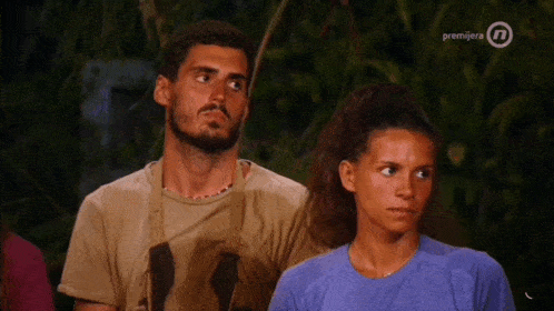 a man and a woman are on a television screen that says premijera on the bottom