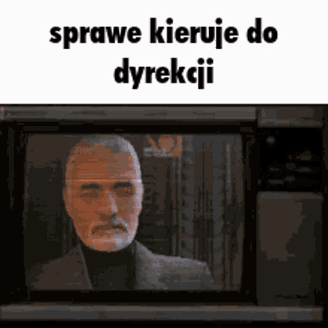a man with a beard is on a tv screen with the words " sprawe kieruje do dyrekcji "