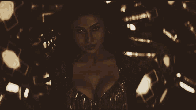 a black and white photo of a woman in a very revealing dress