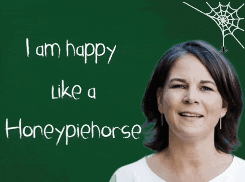 a woman is smiling in front of a green chalkboard that says i am happy like a honeypiehorse