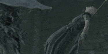 the back of a skeleton 's head is shown with a brick wall in the background