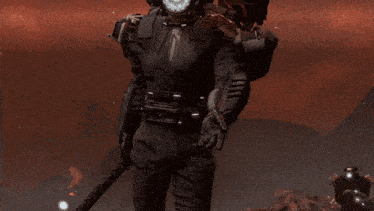 a man in a futuristic suit is holding a spear
