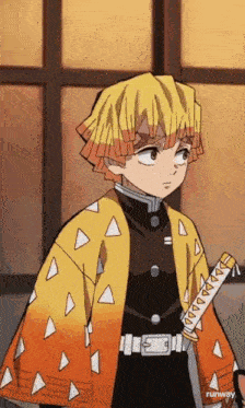 a young boy in a yellow coat is holding a sword .