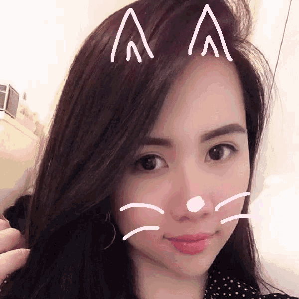a woman with cat ears drawn on her head