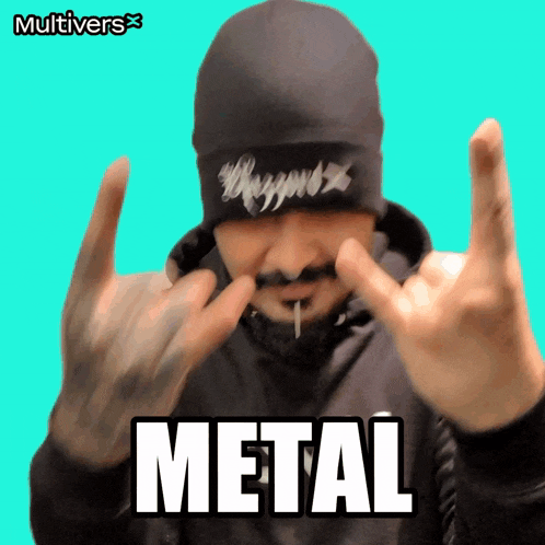 a man wearing a beanie making a horns sign with the word metal above him
