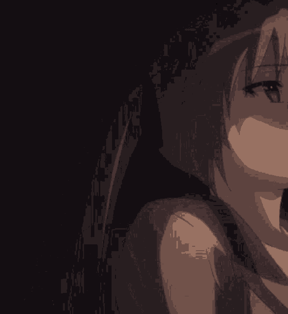 a close up of a person 's face with a dark background