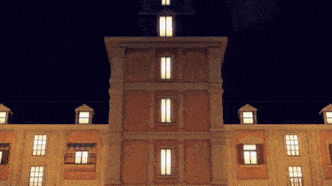 a large building with a clock tower and a lot of windows