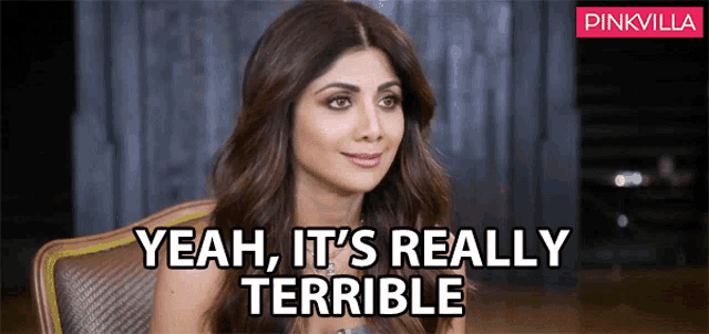 a woman is sitting in a chair with the words " yeah it 's really terrible " written below her