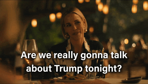 a woman sits at a table with the words are we really gonna talk about trump tonight on the bottom