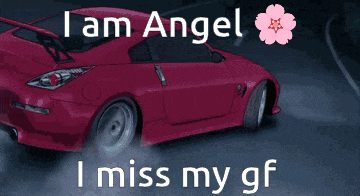 a pink car is driving down a road with the words " i am angel i miss my gf "