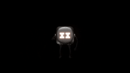 a dice with numbers on it is spinning in the air on a black background .