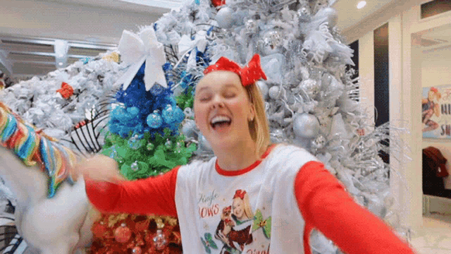 a girl wearing a shirt that says jingle lowns