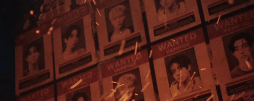 a bunch of wanted vampire posters with flames coming out of them