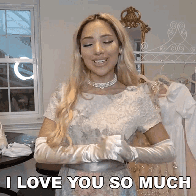 a woman wearing gloves and a pearl necklace says i love you so much