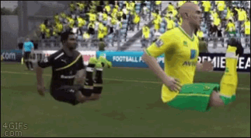 a soccer game is being played on a field with a sign that says premier league