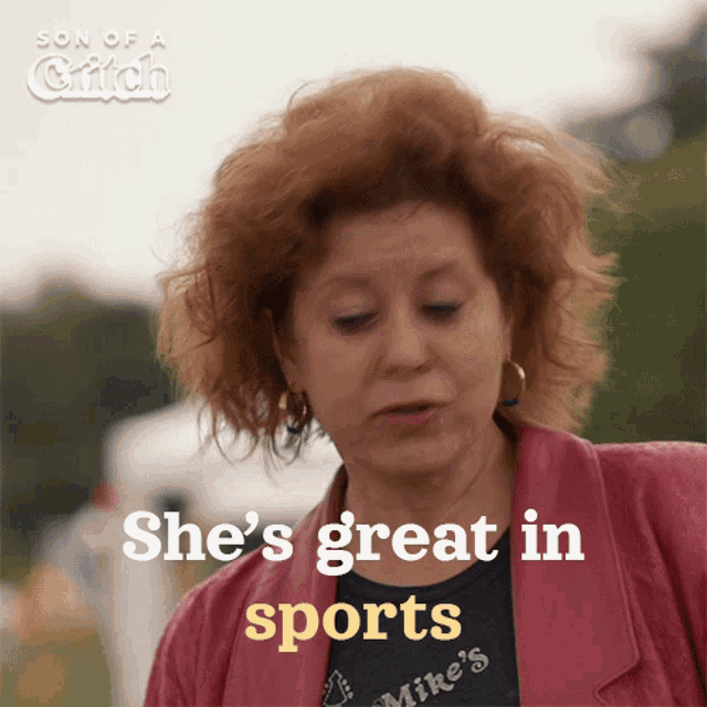 a woman says she 's great in sports while wearing a mike 's shirt