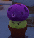 a green cactus with a purple mushroom on top .
