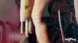 a close up of a person 's legs in a painting with a blurred background .