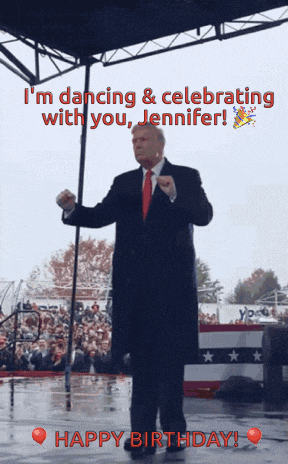 a man in a suit and tie is dancing in front of a crowd with the words i 'm dancing & celebrating