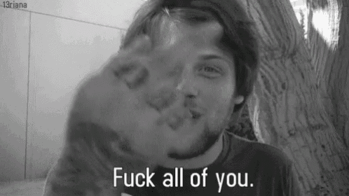 a black and white photo of a man with the words `` fuck all of you '' written on the bottom .