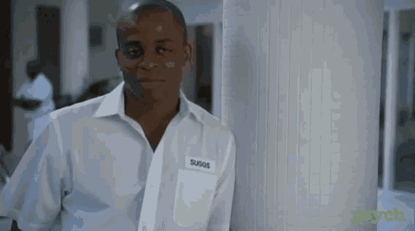 a man with a name tag that says suggs on it