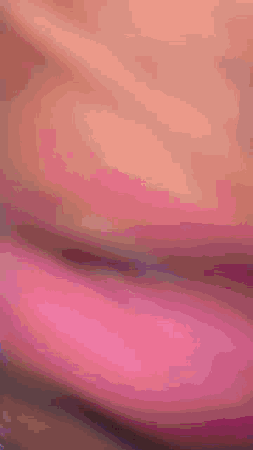 a close up of a person 's lips with a purple border