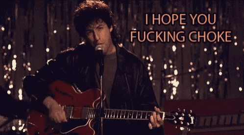 a man singing into a microphone while playing a guitar with the words i hope you fucking choke above him