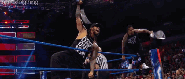 a wrestler wearing a shirt that says " day one ish "