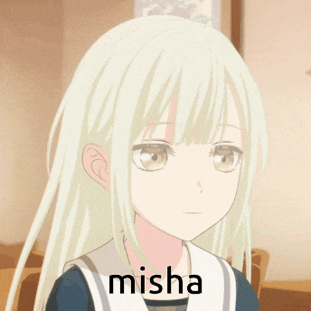 a close up of a girl with the word misha on the bottom