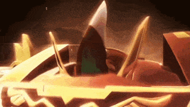 a close up of a cartoon character 's head with a sword coming out of it 's mouth .