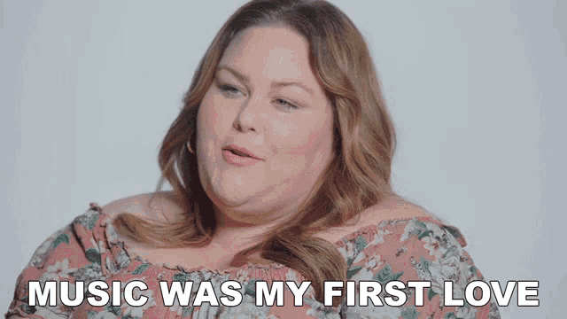 a woman says music was my first love in front of a white background