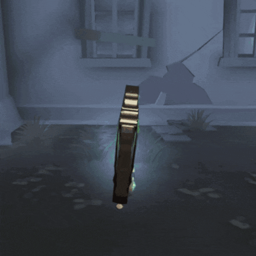 a glowing green object is sitting on the ground in a dark room
