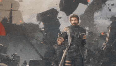 a man with a beard is holding a gun in front of a building