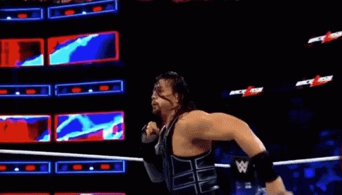 Roman Reigns Superman Punch GIF - Roman Reigns Superman Punch Samoa Joe GIFs
