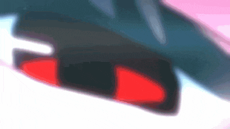 a close up of a red light on a car 's rear view mirror .