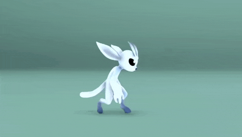 a white cartoon rabbit is running on a green surface .